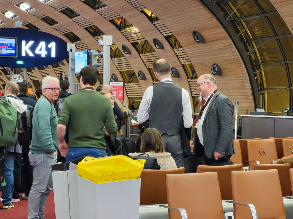 People wearing the “Bayern International” lanyards.